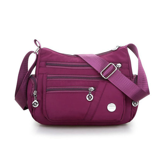 Unisex Shoulder Bag with Multiple Pockets and Adjustable Strap